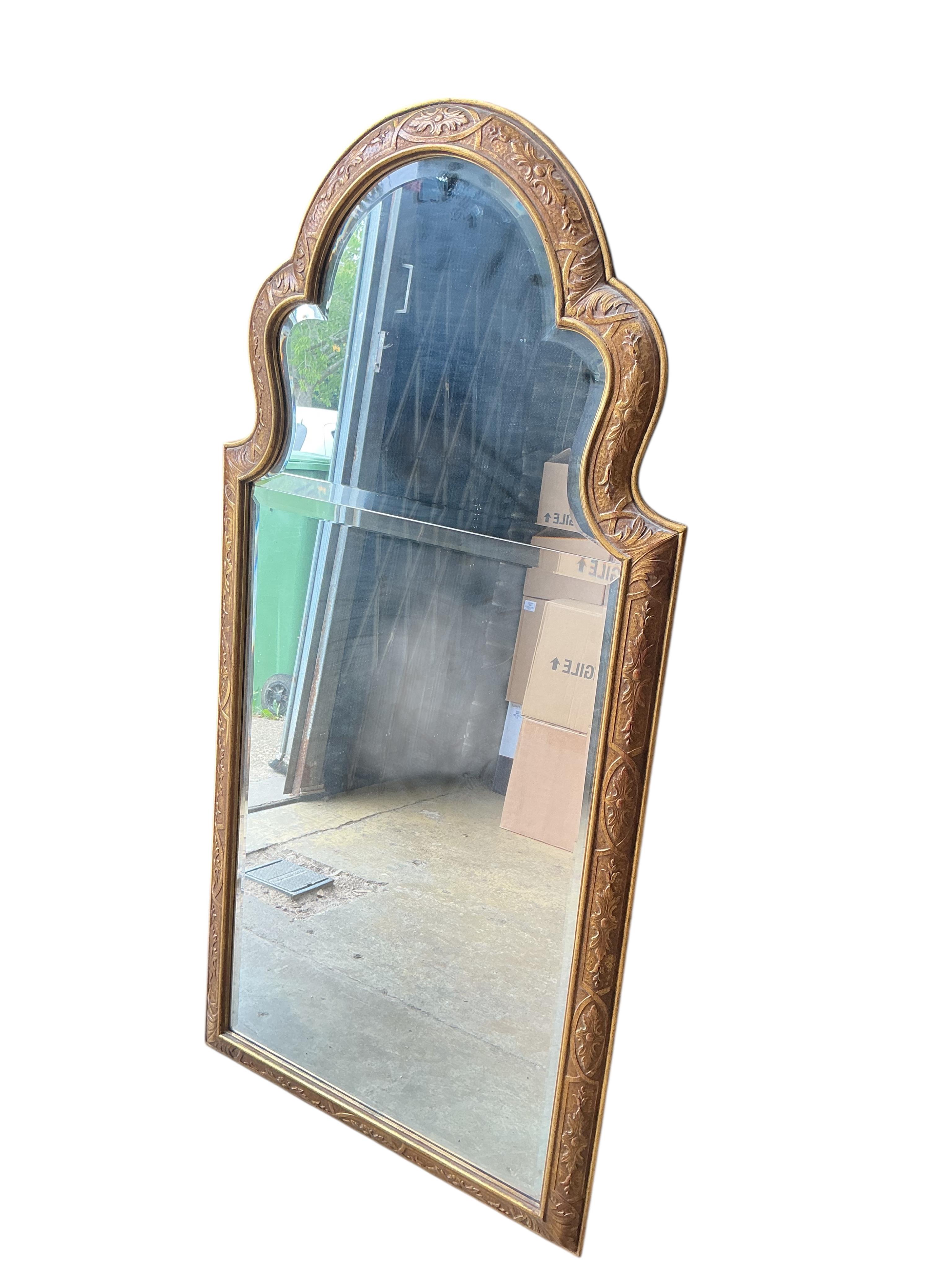A Queen Anne style giltwood wall mirror with two part plate, width 66cm, height 134cm